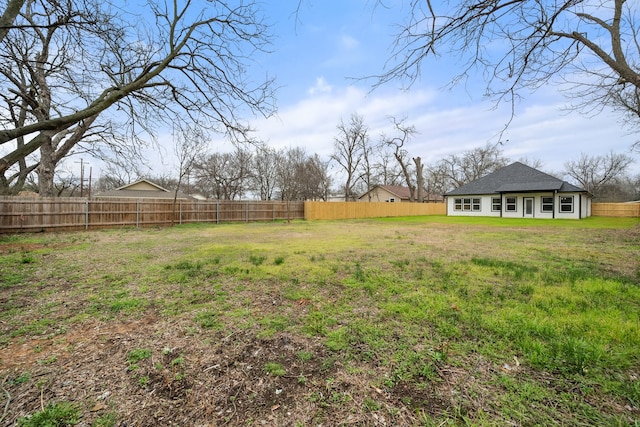 view of yard featuring a fenced backyard