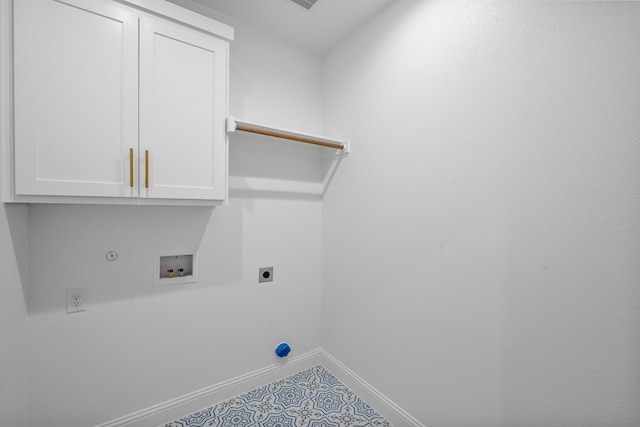 washroom with hookup for a washing machine, hookup for a gas dryer, hookup for an electric dryer, baseboards, and cabinet space