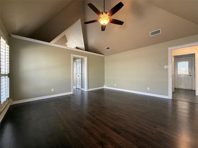 spare room featuring dark wood-style floors, baseboards, and visible vents