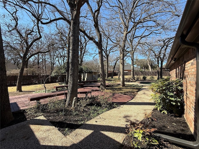 view of yard featuring a patio area and a fenced backyard