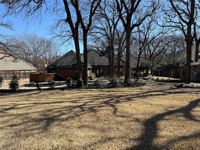 view of yard with fence