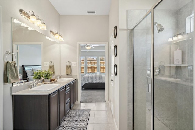 full bathroom featuring ensuite bath, visible vents, a sink, and a shower stall