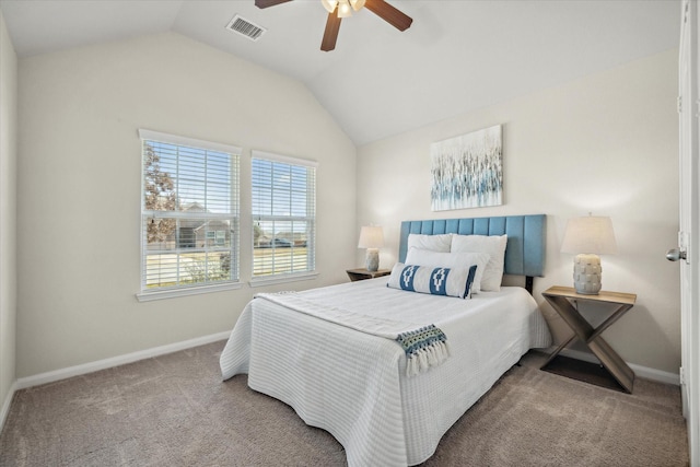 carpeted bedroom with a ceiling fan, visible vents, vaulted ceiling, and baseboards