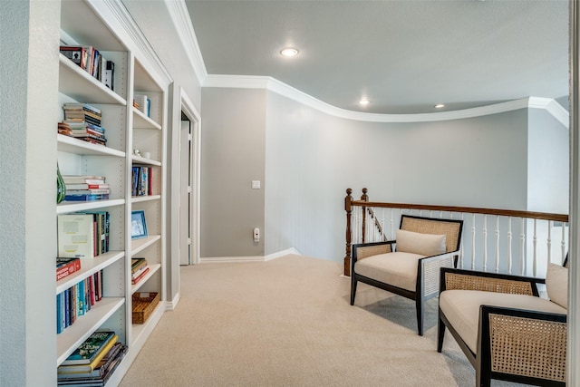 sitting room featuring carpet floors, recessed lighting, ornamental molding, and baseboards