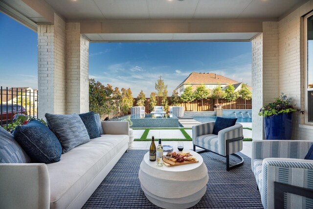 view of patio with a fenced backyard, outdoor lounge area, and a fenced in pool