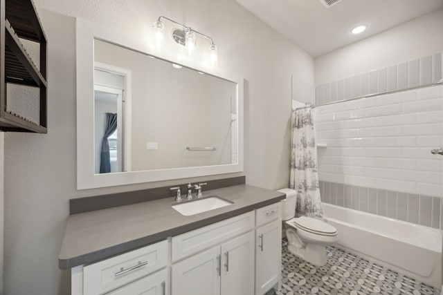 full bath featuring visible vents, vanity, toilet, and shower / bathtub combination with curtain