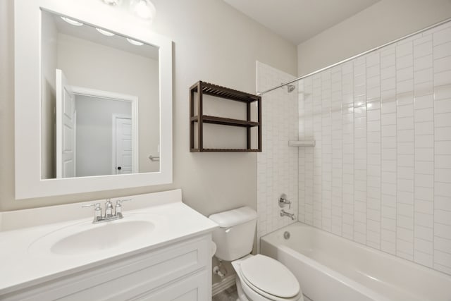 full bath featuring toilet, bathing tub / shower combination, and vanity