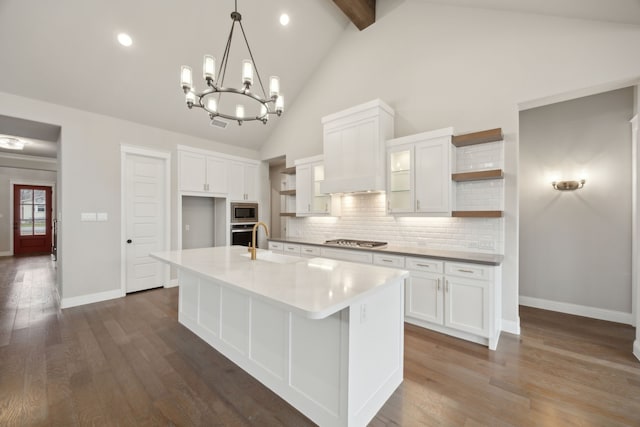 kitchen with open shelves, appliances with stainless steel finishes, dark wood-type flooring, white cabinetry, and a sink