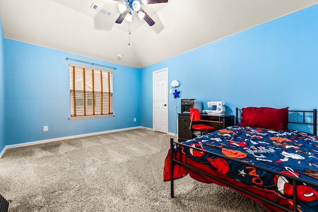 bedroom with vaulted ceiling, carpet floors, visible vents, and baseboards