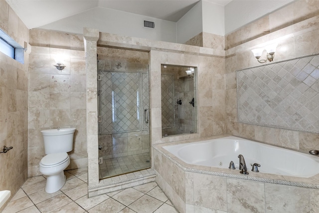 bathroom featuring a garden tub, tile walls, visible vents, toilet, and a stall shower