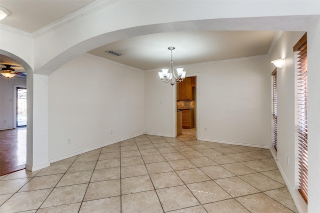 empty room with arched walkways, visible vents, crown molding, and ceiling fan with notable chandelier