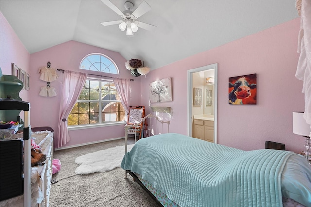 bedroom with baseboards, a ceiling fan, lofted ceiling, ensuite bath, and carpet