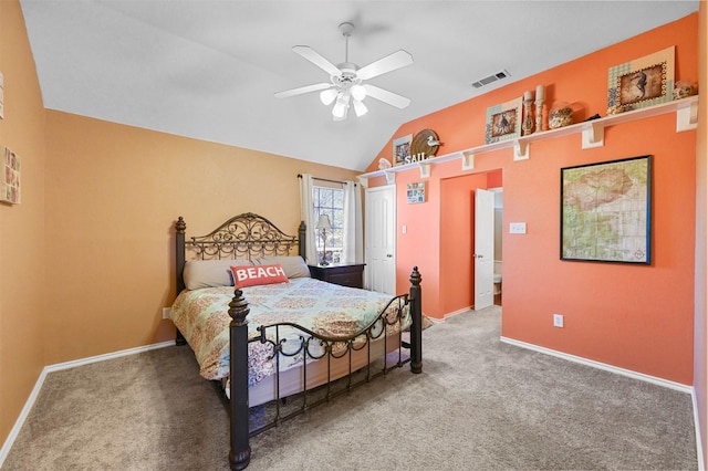 bedroom featuring baseboards, visible vents, a ceiling fan, lofted ceiling, and carpet flooring