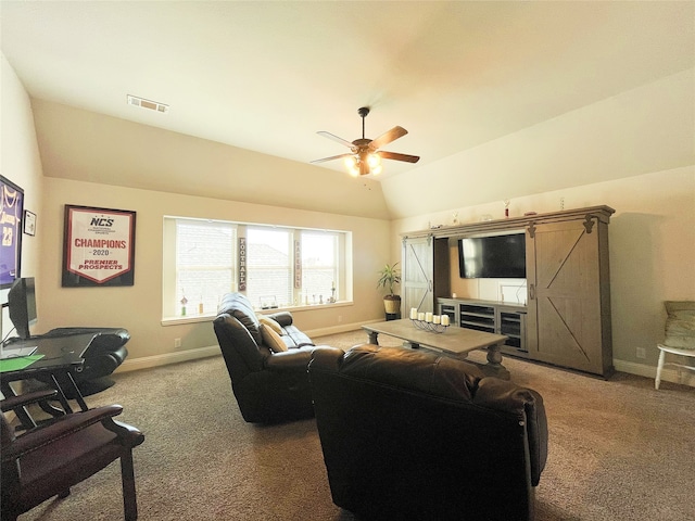 living area featuring lofted ceiling, carpet flooring, visible vents, and baseboards