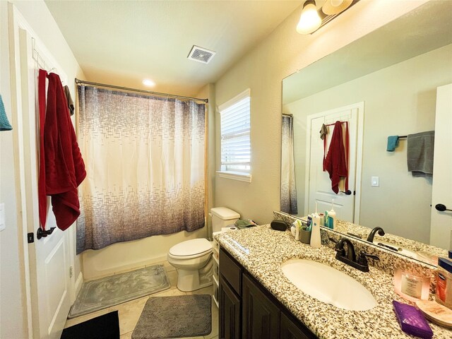 bathroom with shower / tub combo, visible vents, toilet, tile patterned flooring, and vanity