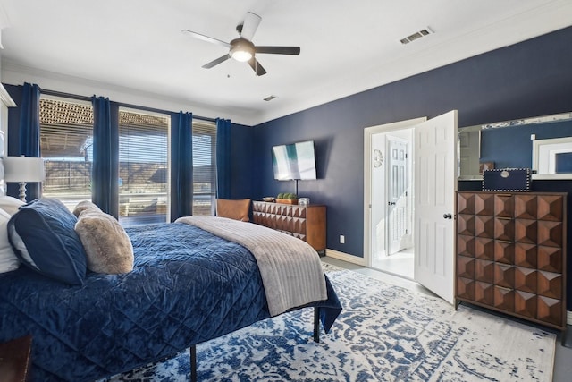 bedroom with visible vents, a ceiling fan, and baseboards