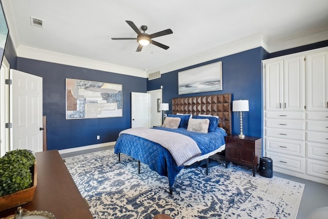 bedroom featuring ceiling fan, visible vents, baseboards, and ornamental molding