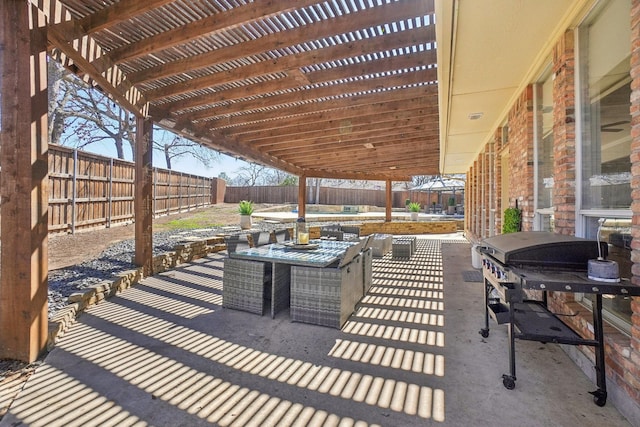 view of patio / terrace with a pergola and a fenced backyard