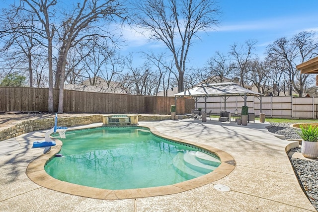 view of pool with a gazebo, a fenced in pool, a fenced backyard, and a patio area