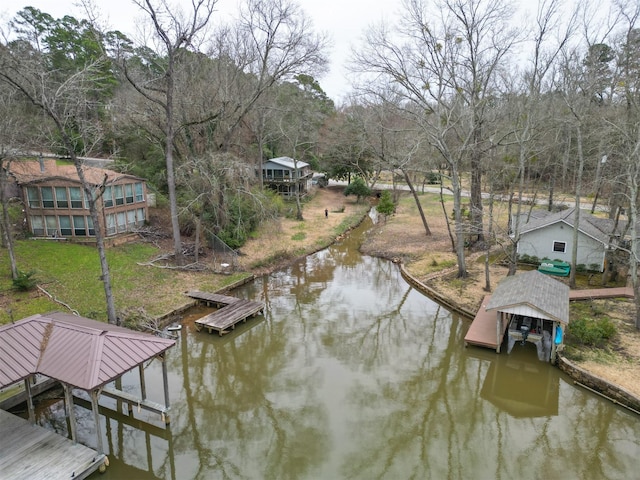 dock area featuring a water view and boat lift