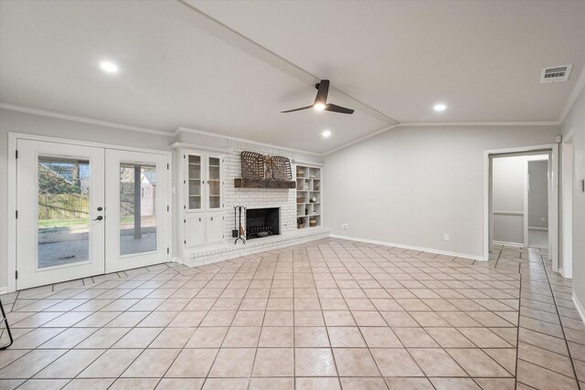 2013 Glenwood Cir, Corsicana, TX 75110 - unfurnished living room with ornamental molding, a ceiling fan, french doors, lofted ceiling, and baseboards