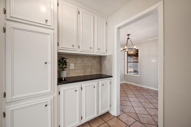 2013 Glenwood Cir, Corsicana, TX 75110 - empty room featuring light colored carpet, ceiling fan, crown molding, and baseboards