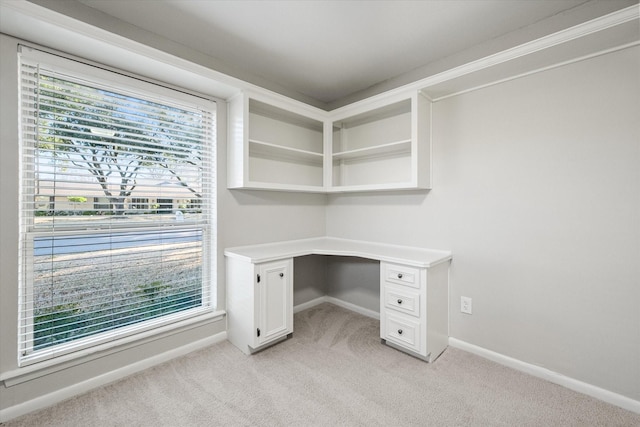 2013 Glenwood Cir, Corsicana, TX 75110 - unfurnished office with light colored carpet, baseboards, and built in study area