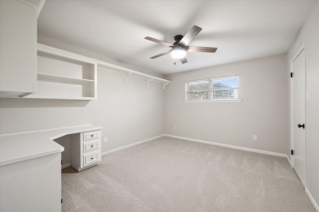 2013 Glenwood Cir, Corsicana, TX 75110 - unfurnished office with light colored carpet, baseboards, and built in desk