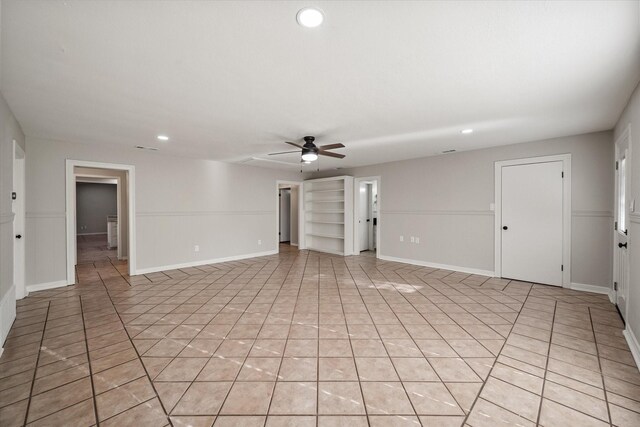 2013 Glenwood Cir, Corsicana, TX 75110 - unfurnished living room with light tile patterned floors, a ceiling fan, baseboards, recessed lighting, and attic access