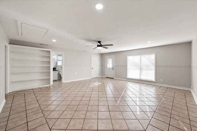 2013 Glenwood Cir, Corsicana, TX 75110 - unfurnished living room featuring light tile patterned flooring, a ceiling fan, baseboards, recessed lighting, and attic access