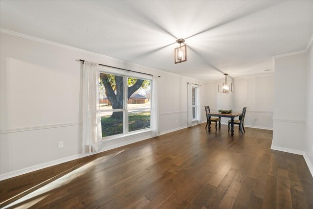 2013 Glenwood Cir, Corsicana, TX 75110 - dining room featuring a chandelier, hardwood / wood-style flooring, baseboards, and ornamental molding