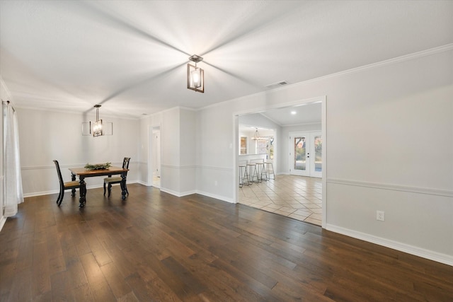 2013 Glenwood Cir, Corsicana, TX 75110 - dining space with a chandelier, hardwood / wood-style floors, ornamental molding, and baseboards