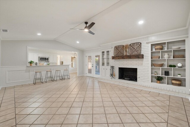2013 Glenwood Cir, Corsicana, TX 75110 - detailed view of ornamental molding, baseboards, and a brick fireplace