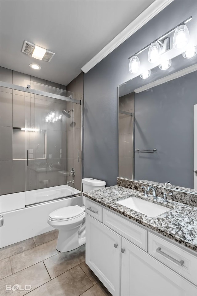 bathroom featuring visible vents, toilet, ornamental molding, shower / bath combination with glass door, and vanity