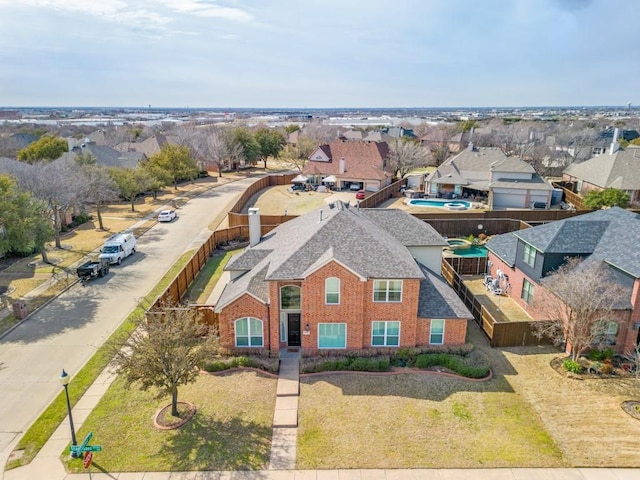 drone / aerial view with a residential view