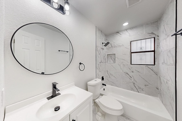 full bath featuring shower / bath combination, visible vents, vanity, and toilet