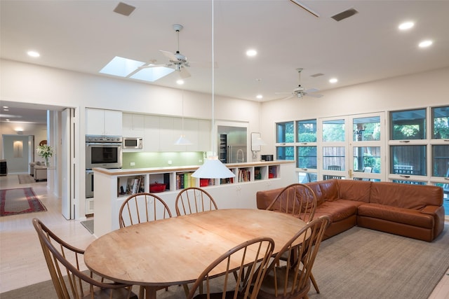 dining space with plenty of natural light, recessed lighting, visible vents, and ceiling fan