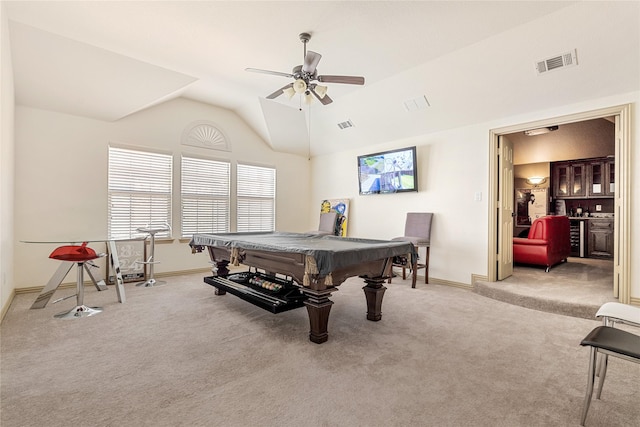 rec room with carpet, lofted ceiling, visible vents, ceiling fan, and baseboards