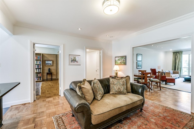 living area with baseboards, recessed lighting, and crown molding