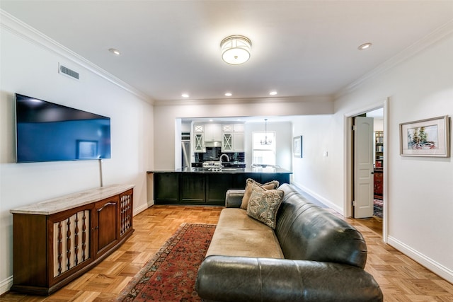 living room featuring ornamental molding, recessed lighting, and baseboards