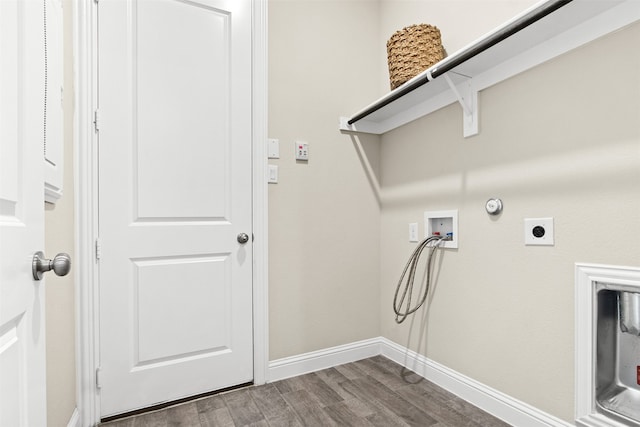 washroom with gas dryer hookup, laundry area, washer hookup, dark wood-style flooring, and baseboards