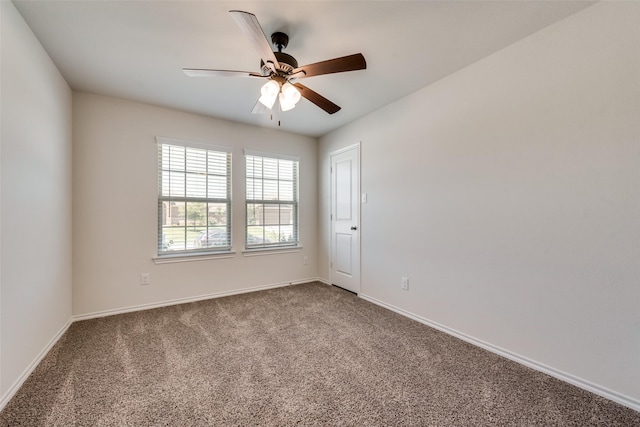 unfurnished room with carpet floors, ceiling fan, and baseboards