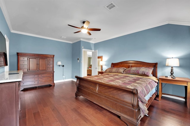 bedroom featuring dark wood-style floors, baseboards, visible vents, and ornamental molding