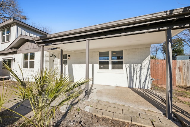 view of front of house with fence