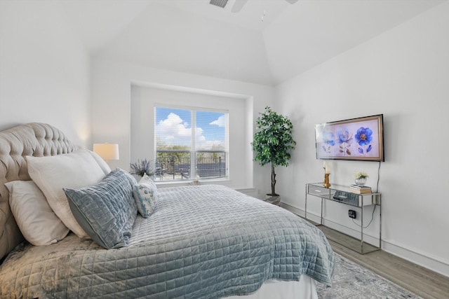 bedroom featuring vaulted ceiling, ceiling fan, wood finished floors, and baseboards