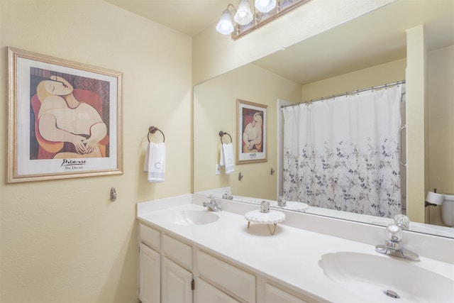 full bathroom with double vanity, a sink, and a shower with shower curtain