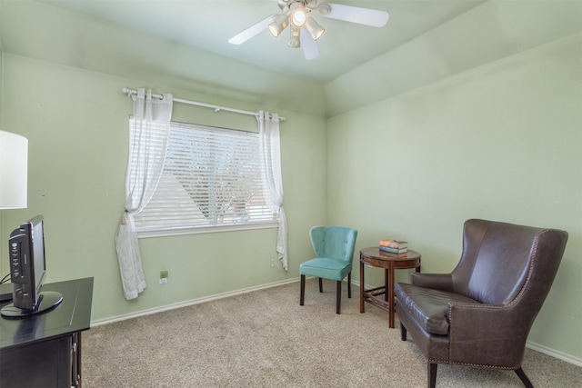 sitting room with ceiling fan, carpet flooring, and baseboards