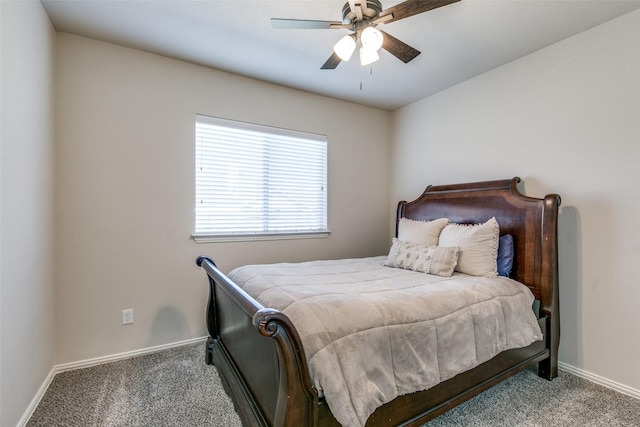 bedroom featuring ceiling fan, carpet floors, and baseboards