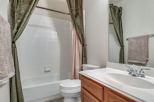 bathroom featuring shower / bath combination with curtain, vanity, and toilet