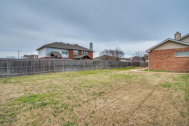 view of yard featuring fence